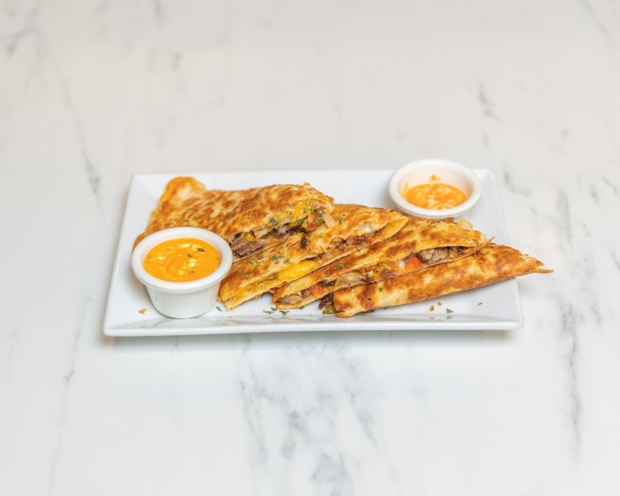 PORK GRIOT QUESADILLA