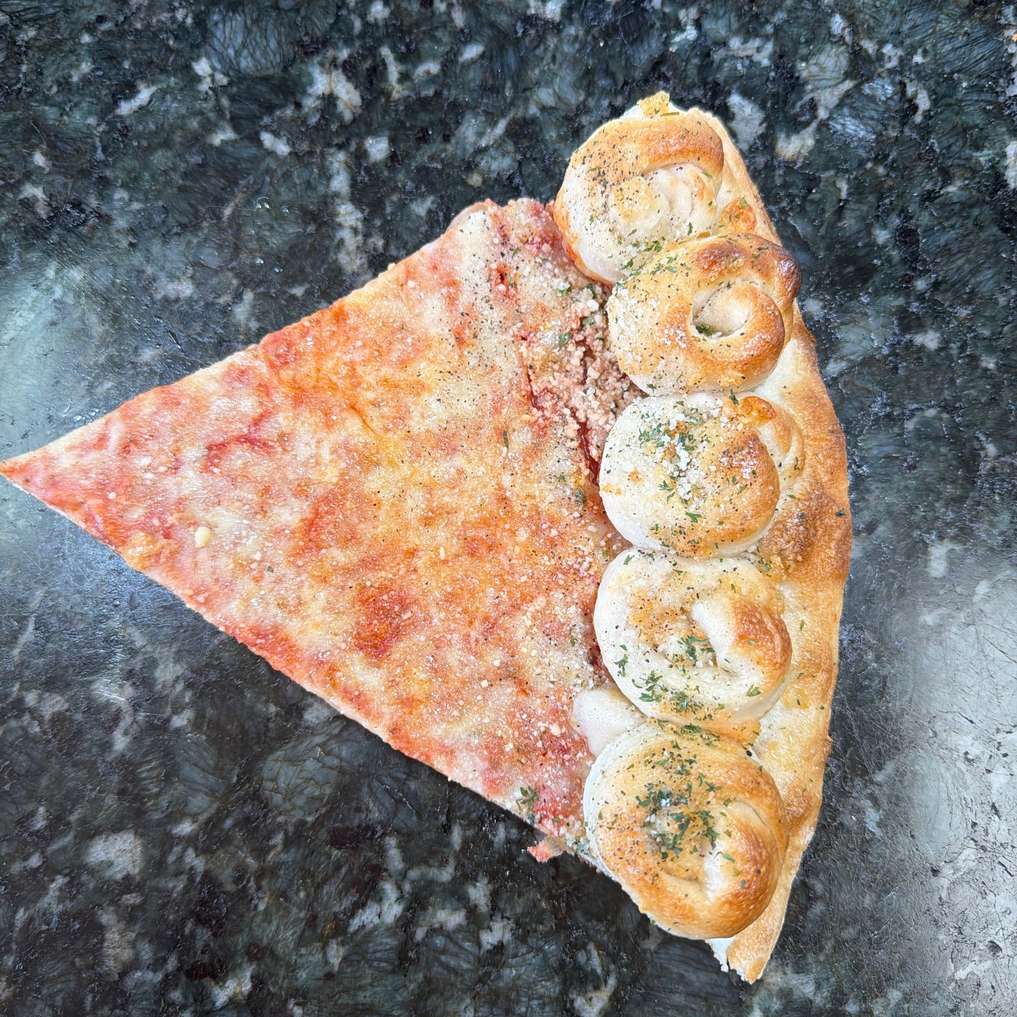 Garlic Knot Crust Pizza Slice