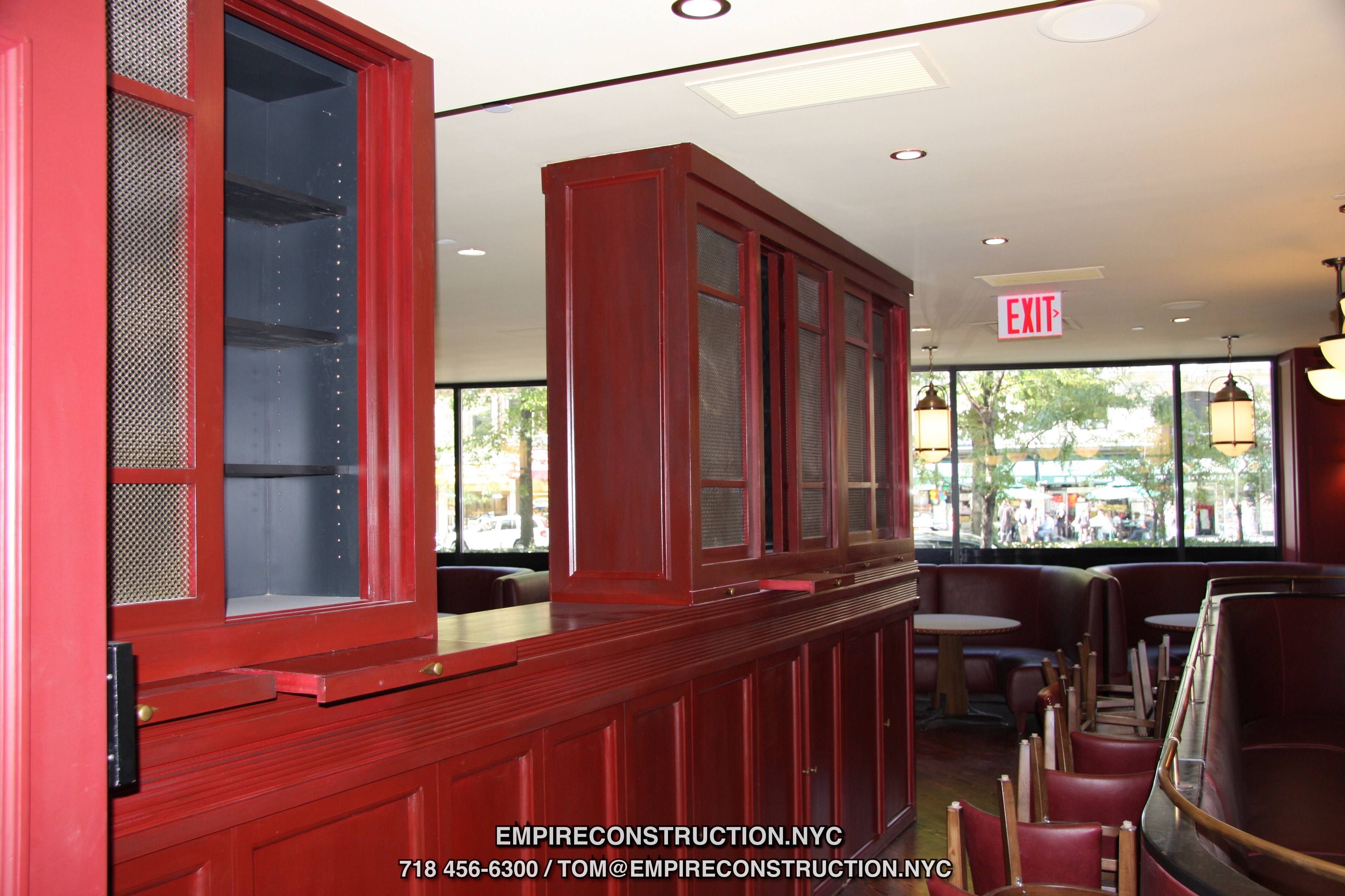 We do custom bars,  furniture and cabinets, maitre D stands, waiter stations, wine storages, custom commercial kitchens, decorative columns, vestiubles, shelves, racks, tables, chairs, storage closets, build ins, paneling, countertops, lighting design, low voltage wirening,  register and computer station set up, video security and fire alarms, wall and floor structures and any other elements that go into bar and restaurant building. 