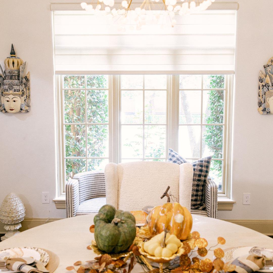 Natural woven shades add style to this dining room