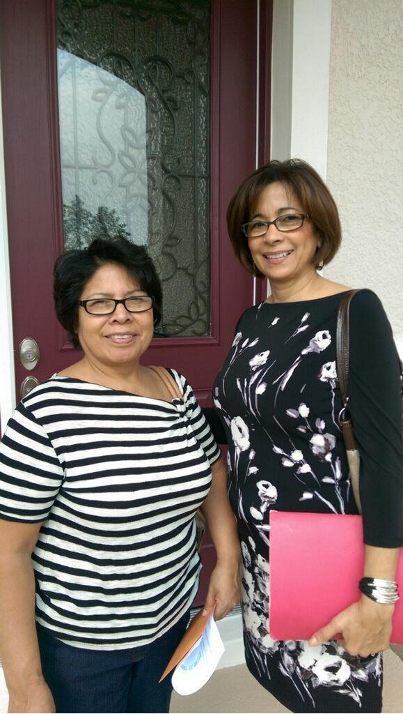 Sara Rivera, proud owner of a custom made home in Wedgefield with Gladys Sola, Realtor