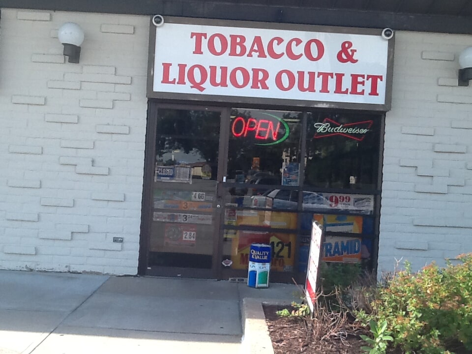 Tobacco and Liquor Outlet Logo