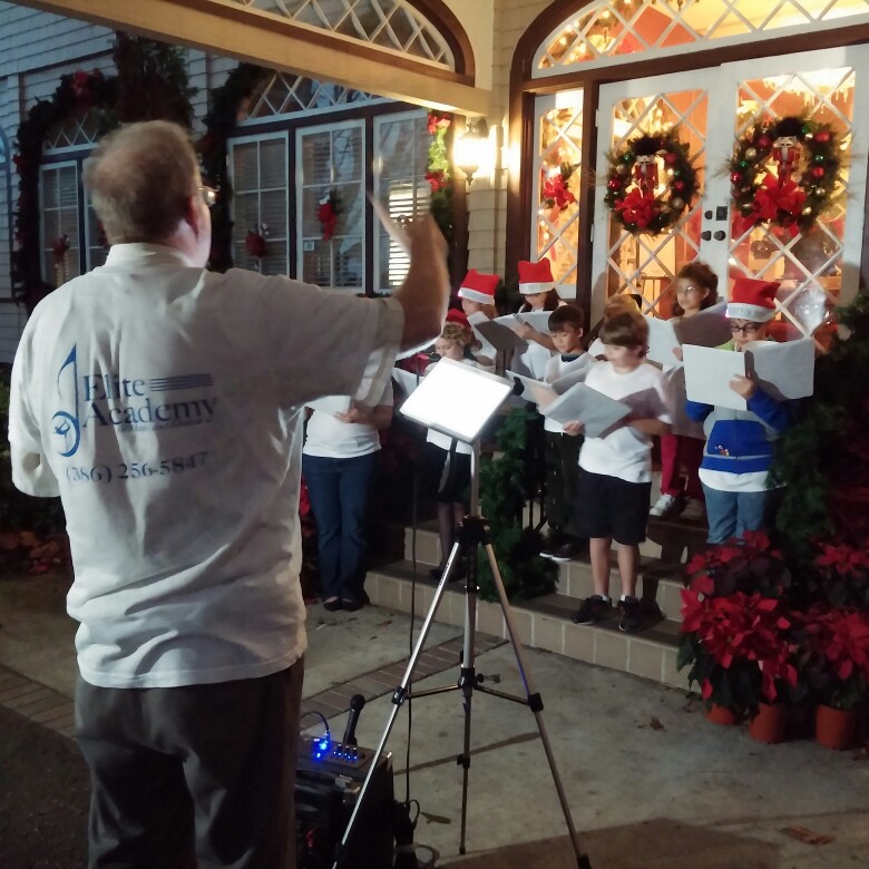 The Elite Academy Choir, conducted by Academy faculty member Donald Kruger, performed beautifully tonight at the Annual Christmas Gala held at the Casements.