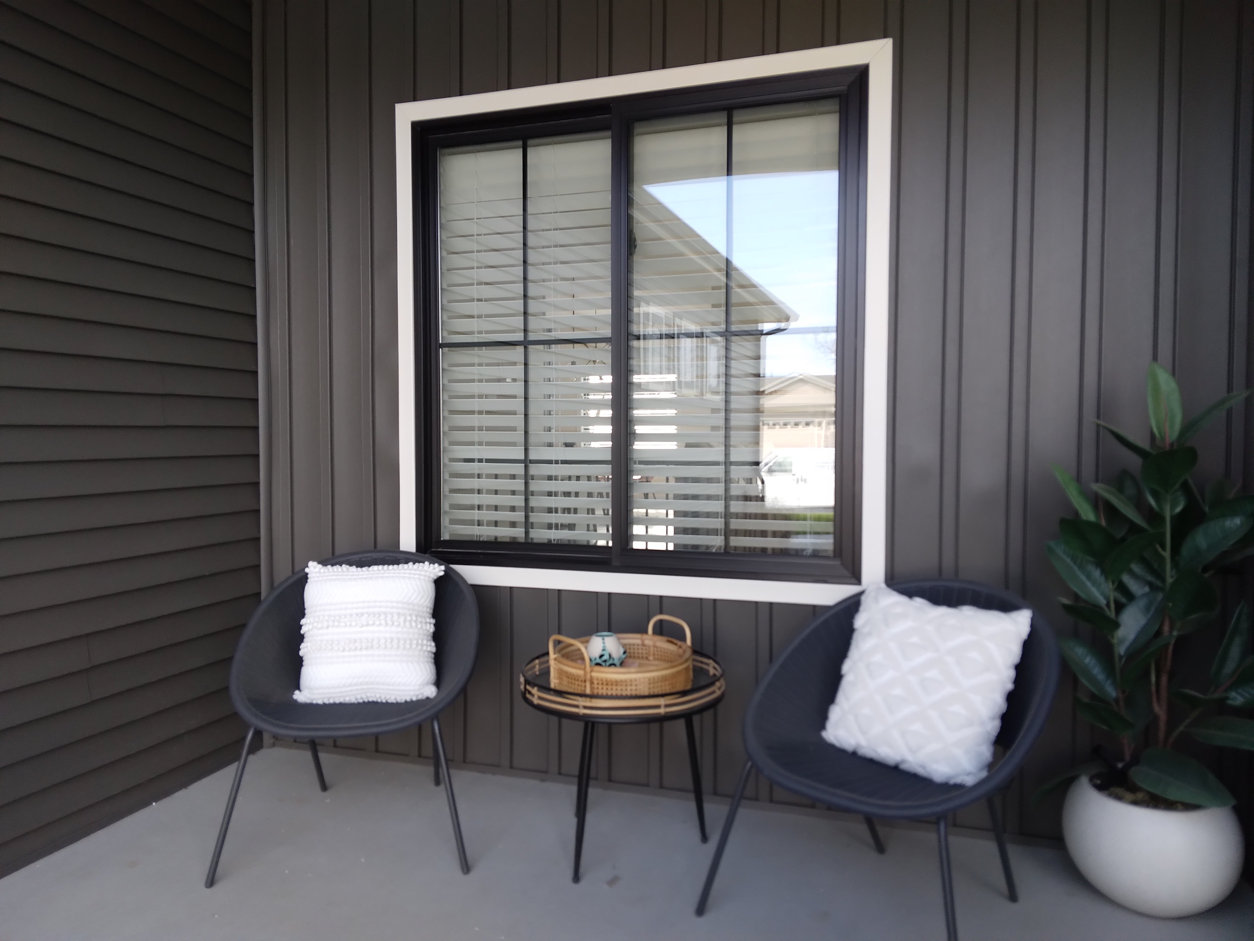 It's important to consider what your window blinds or shades will look like from the outside. These white faux wood blinds look great from both the inside of the house and the outside.  BudgetBlinds  WindowCoverings  Blinds  SpringfieldIllinois