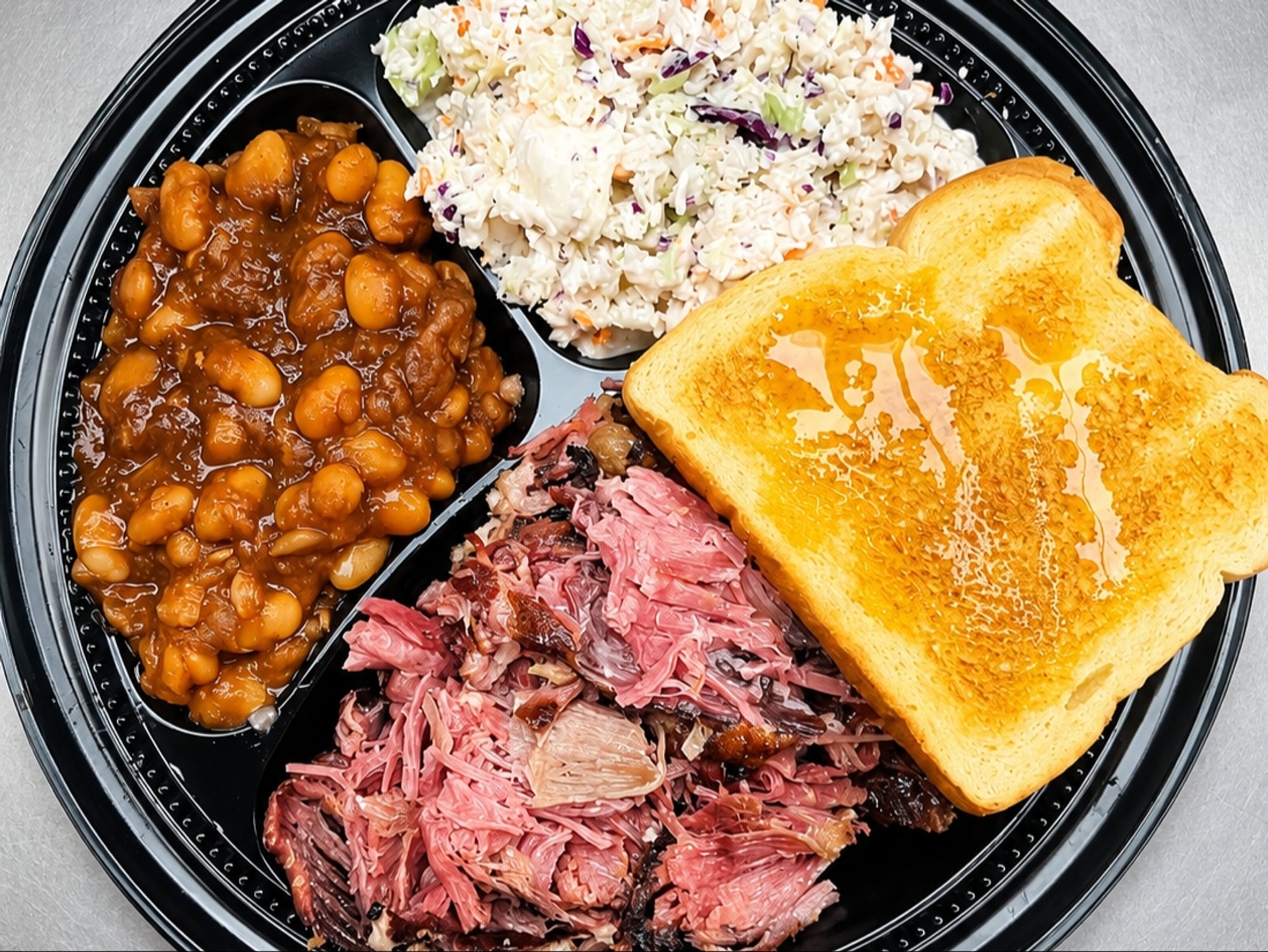 1/3 LB PULLED PORK & 2 SIDES