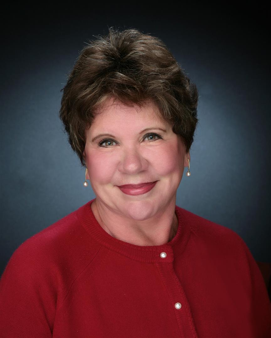 Michele Rising, Associate Broker with RE/MAX Legacy