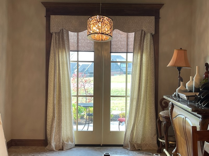 The woodwork, the antique furniture, the gorgeous chandelier-this Owasso space needed something way better than your average curtains! We built up that old-fashioned look with these beautiful Draperies!  BudgetBlindsOwasso  OwassoOK  CustomDraperies  FreeConsultation  WindowWednesday