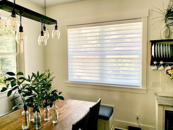 How cozy is this local dining space? Our stunning cellular shades complement this space perfectly, while adding much-needed shade to enjoy your meals peacefully. Plus, our cellular shades are energy efficient, which can reduce your electric bills.