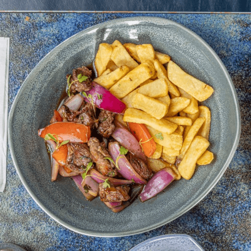 Lomo Saltado Flambeado