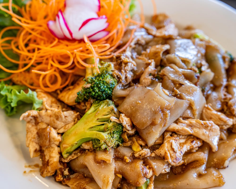 Pad See Ew served with 1 Crispy Veg Roll