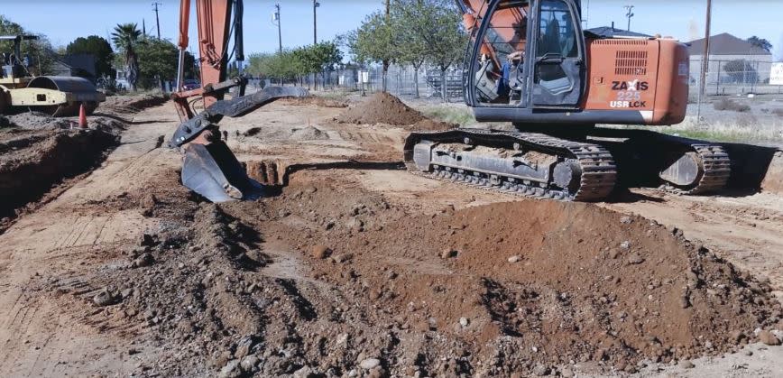 Trinity  River Construction Inc Logo