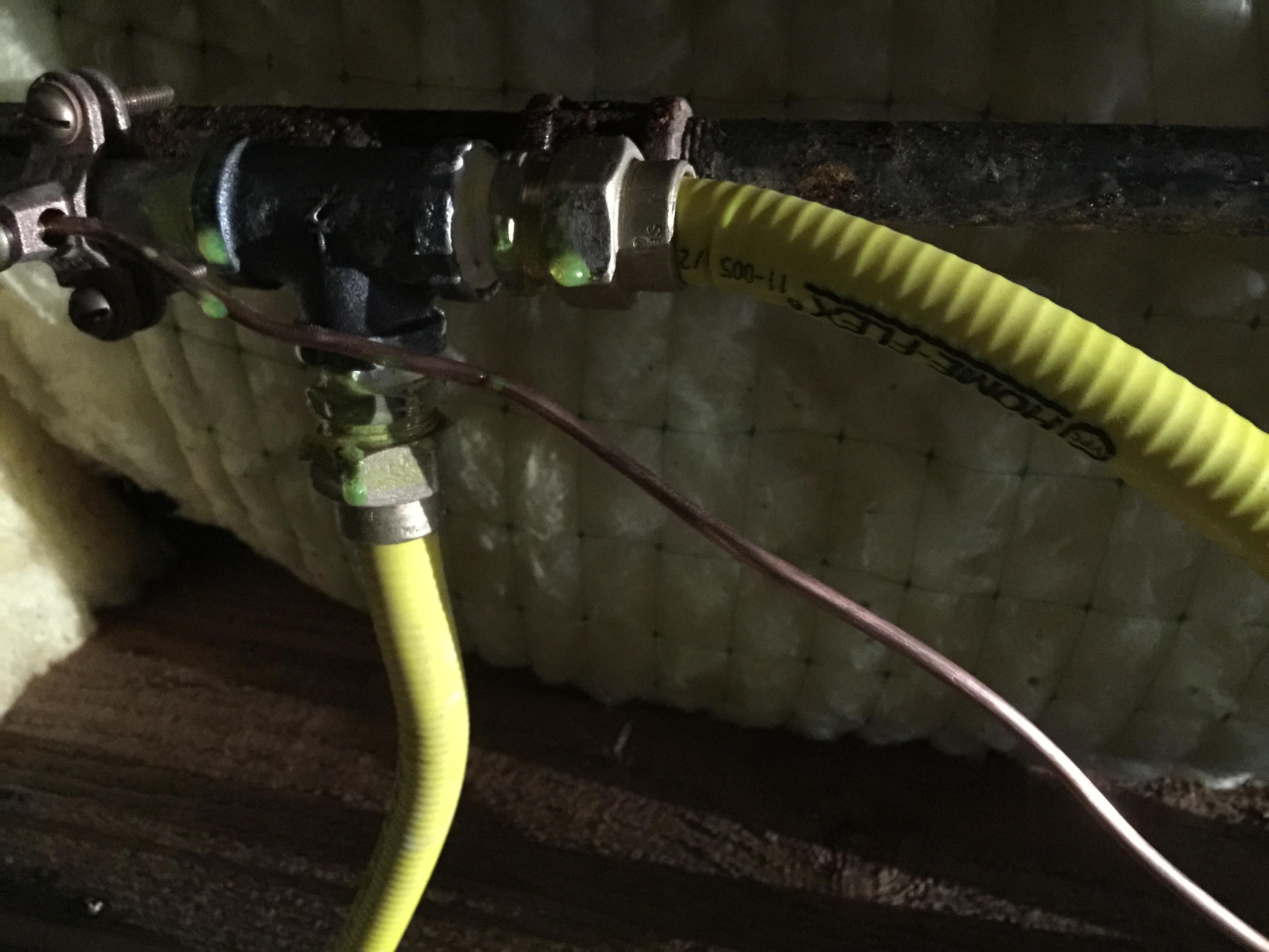 Tap into black iron pipe gas line with home flex gas line for a kitchen stove hook up