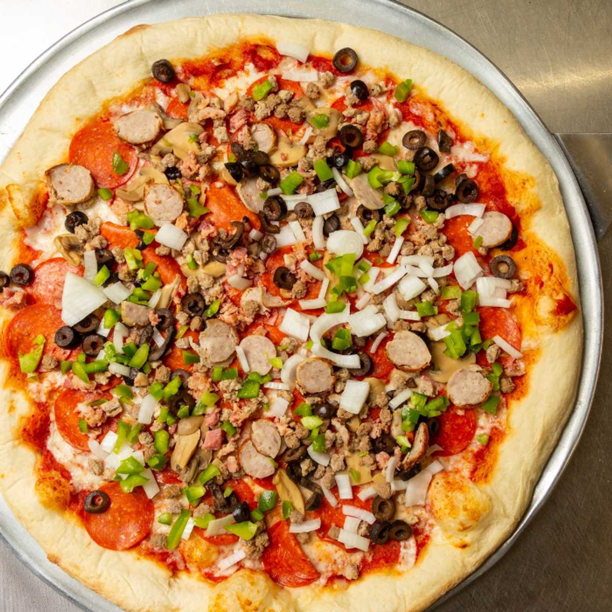 Tatos Supreme Pizza