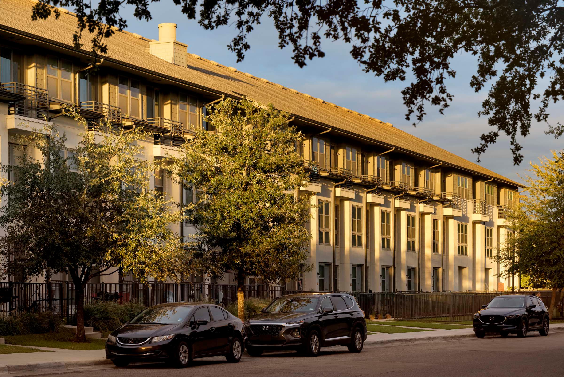 Exterior view of Villas building showing parking in front