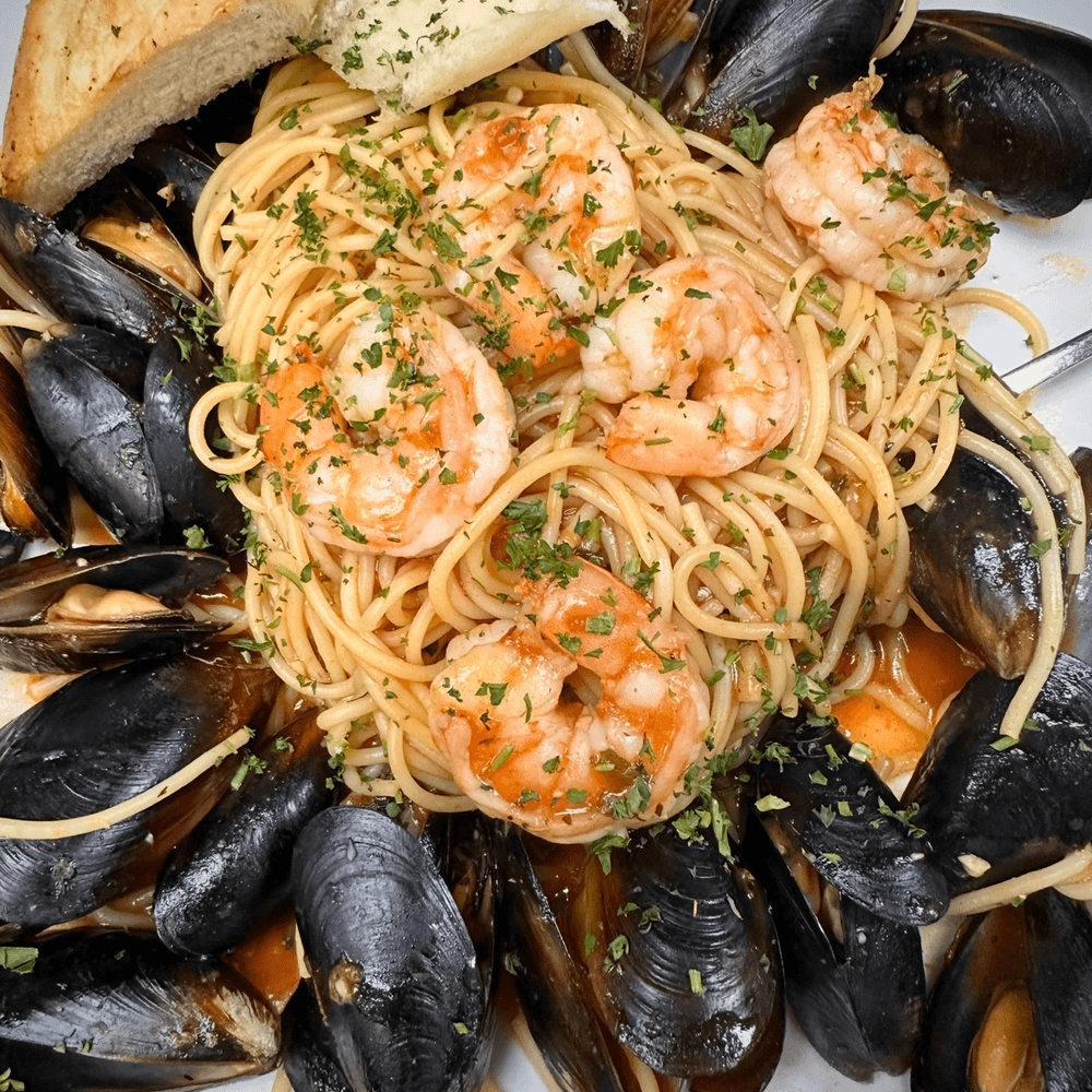 SPAGHETTI CON FRUTTA DI MARE