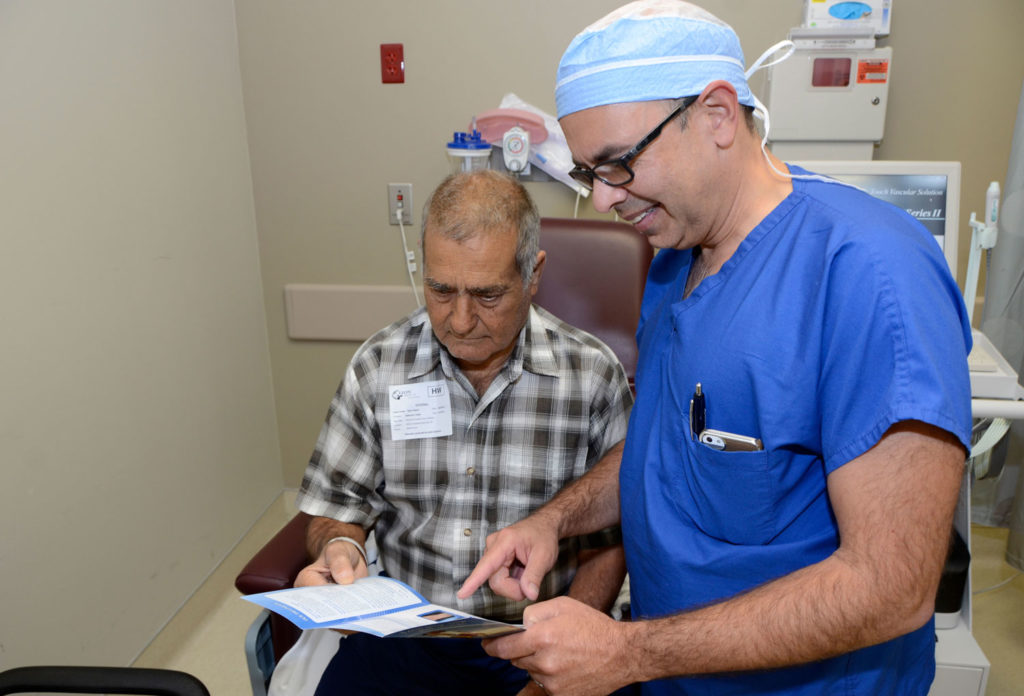 A doctor and patient at Azura Vascular Care Miami