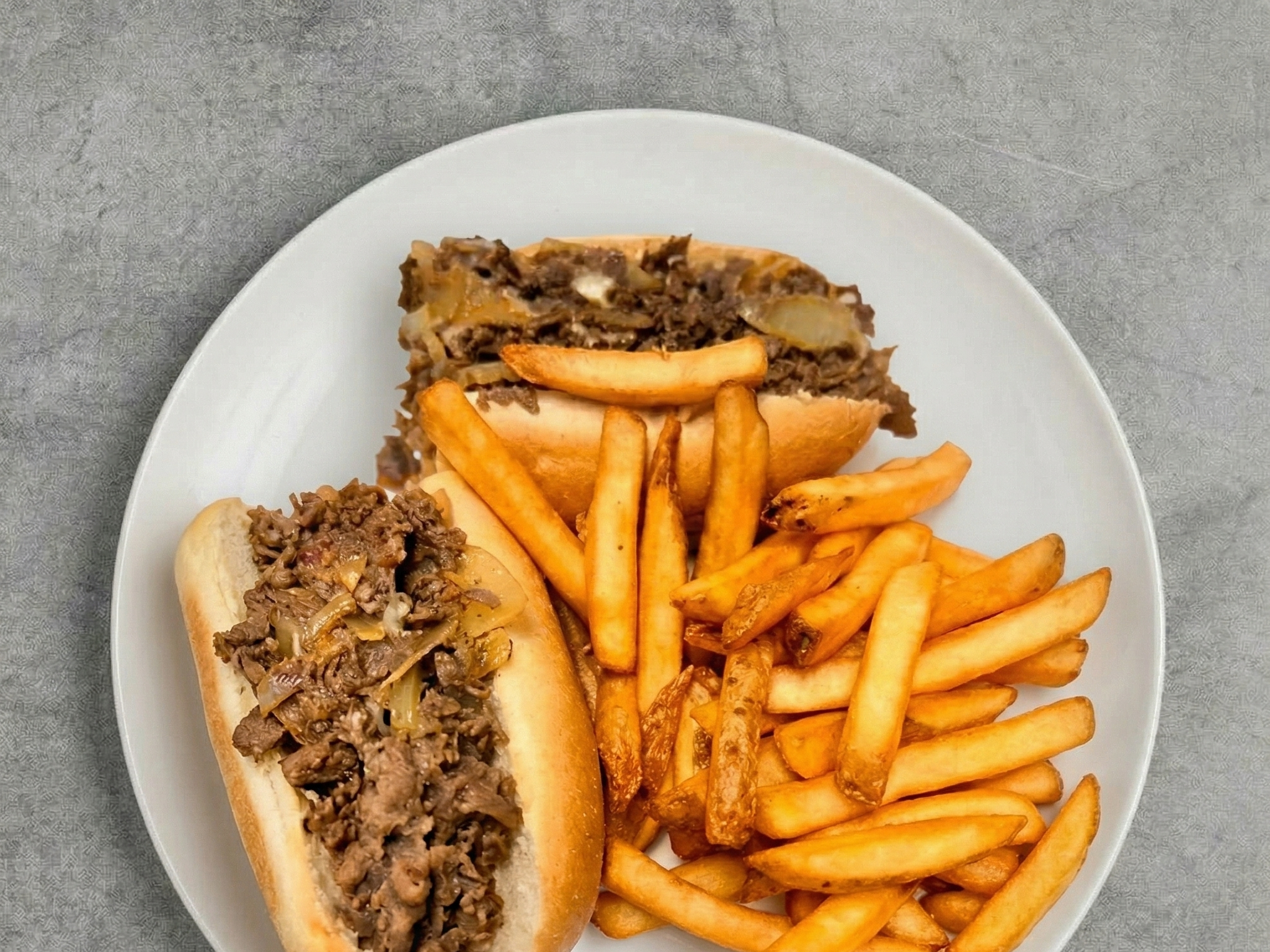 Cheesesteak With Fries & Canof Soda