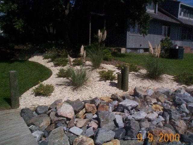Southern Landscaping &amp; Construction, Inc. Logo