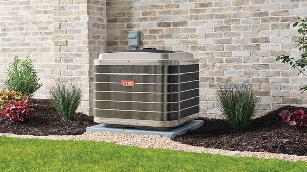Bryant Air Conditioning Unit in front of house