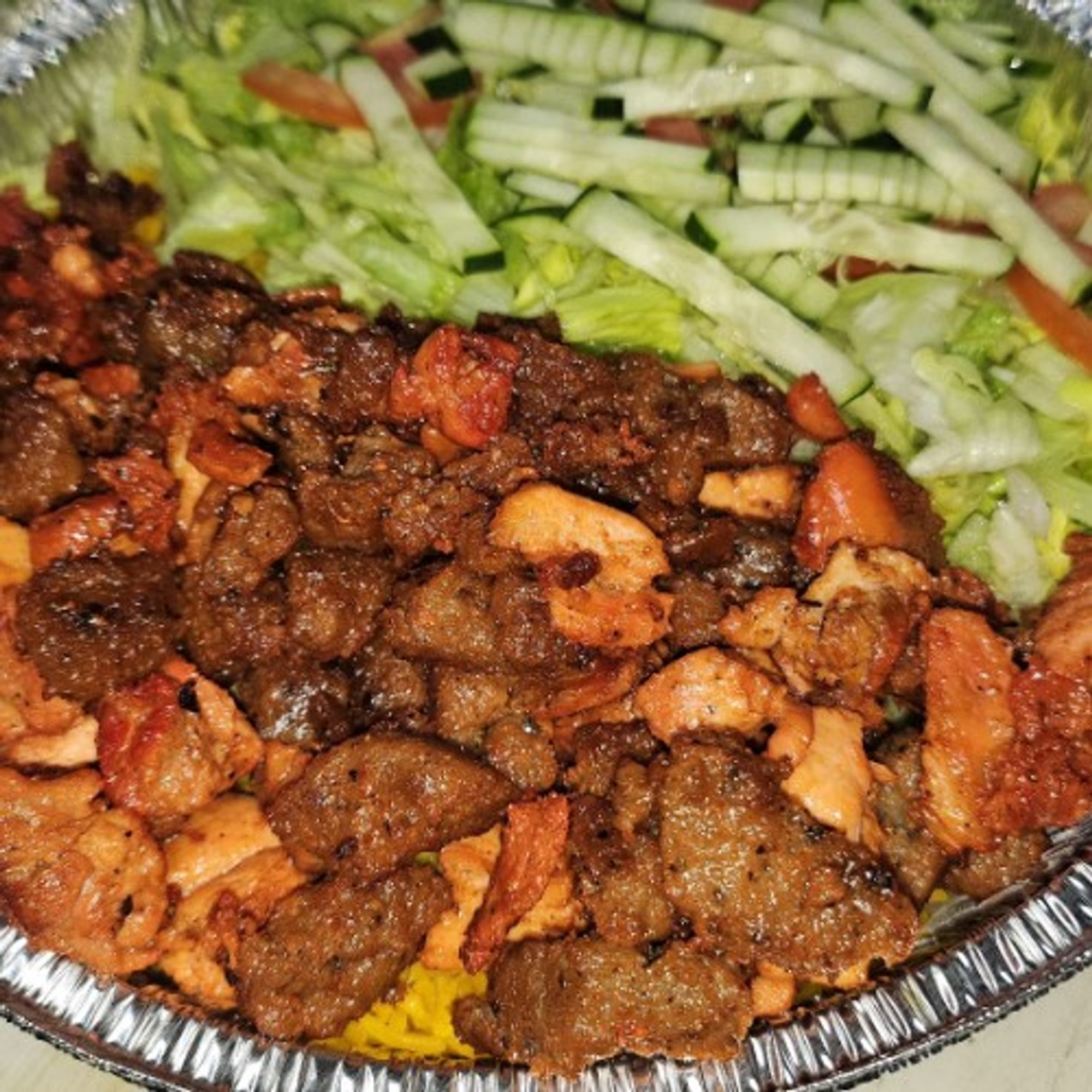 Mixed Lamb and Chicken Over Salad