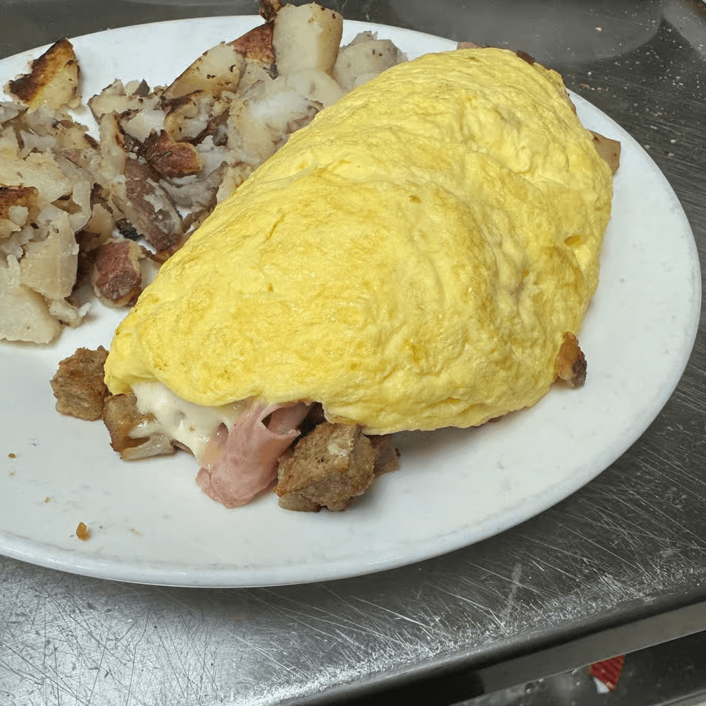Scrapple Ham, Mushroom, Onion, Provolone Omelete