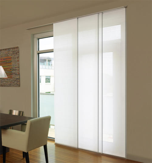 Sliding panel track shades offer a contemporary solution for large patio doors and windows.