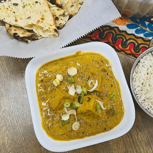 Tofu Curry Served with Rice and Garlic naan