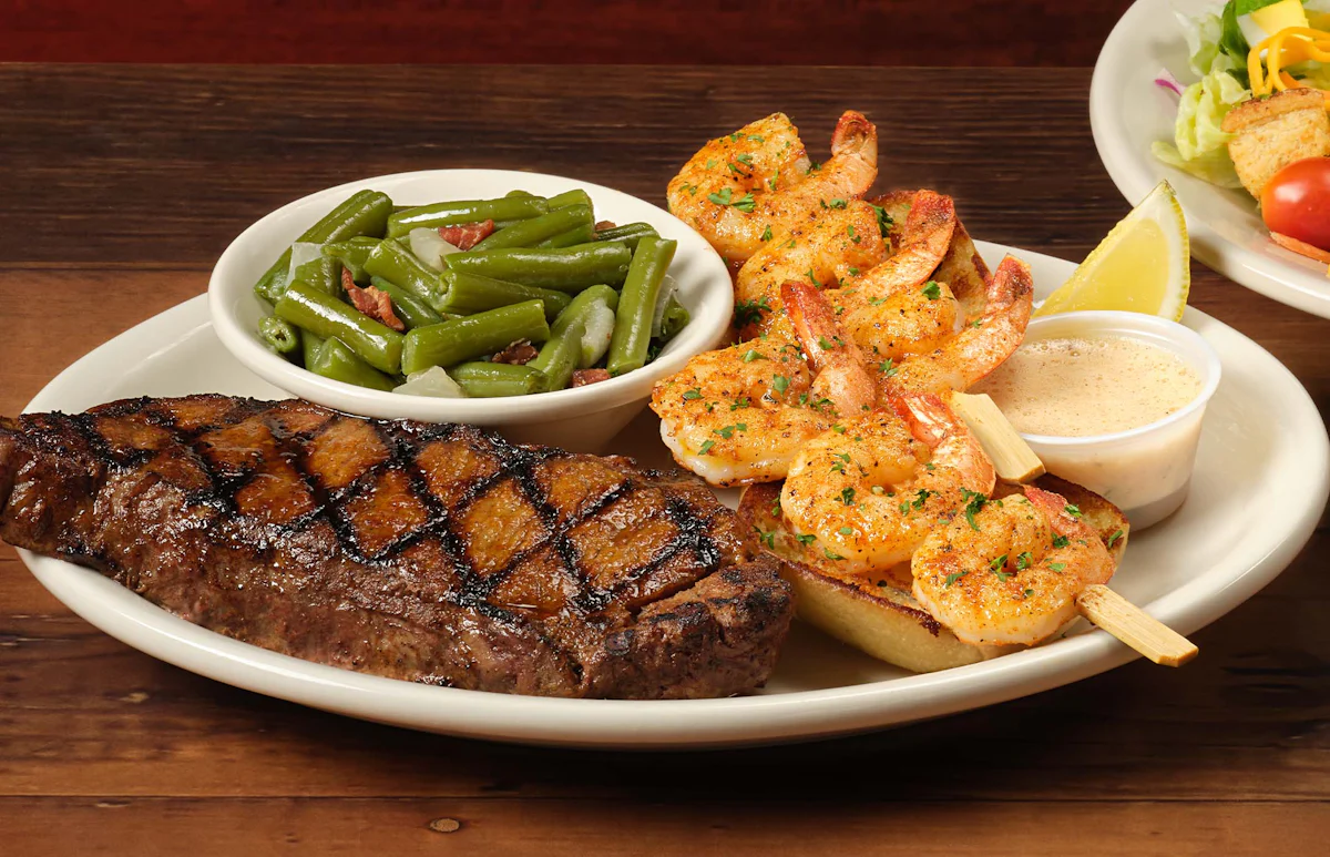 Strip* 12oz & Grilled Shrimp 