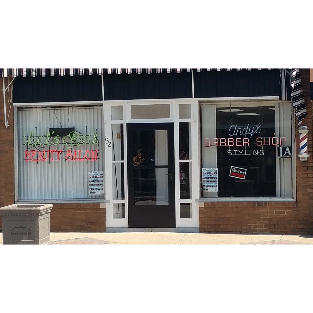 Andy's Hairport Barber Shop Logo