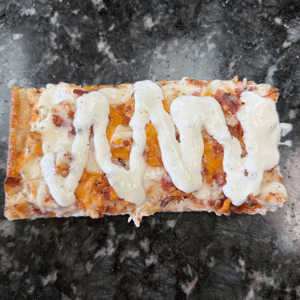 Bacon Chicken Ranch Pizza Slice
