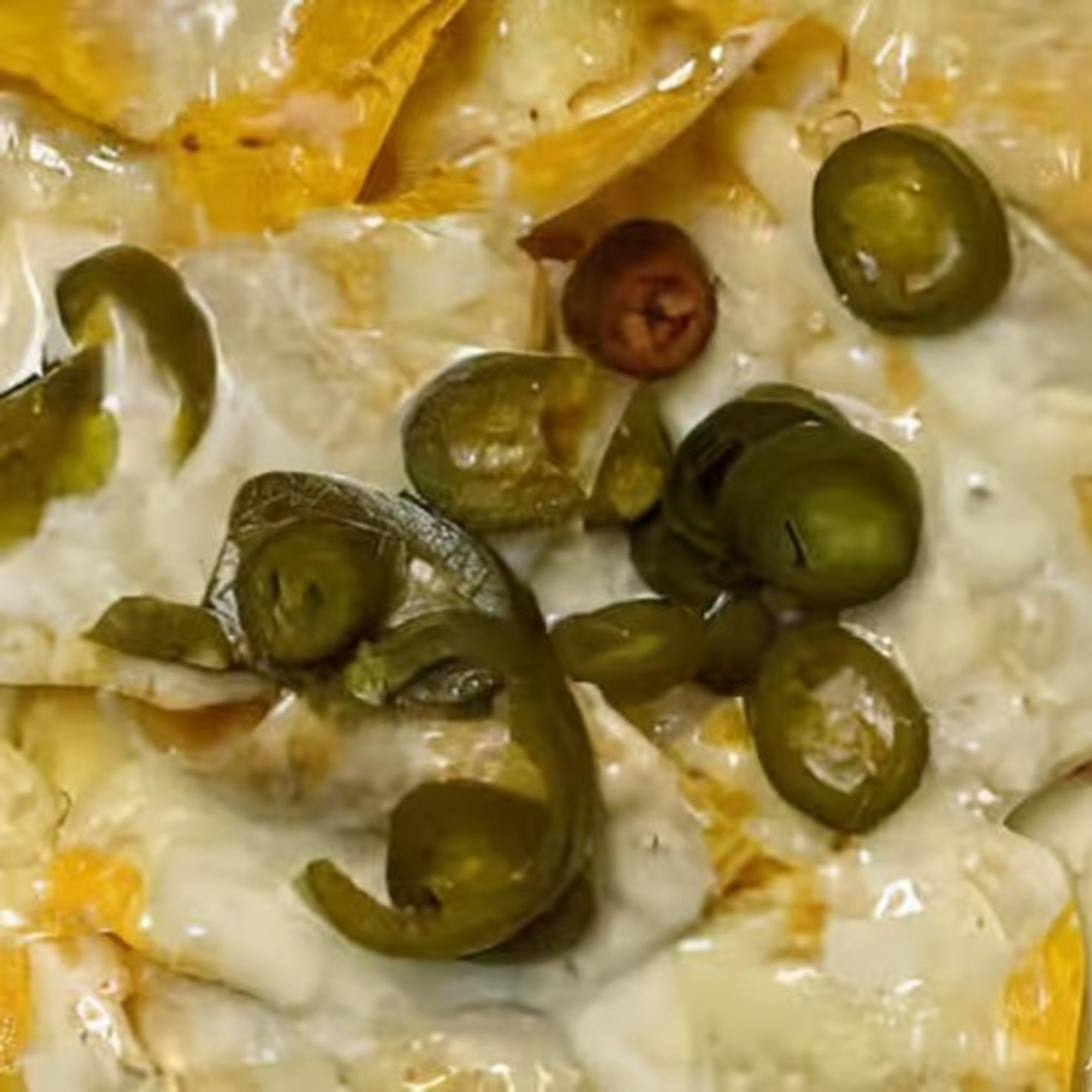 42. Cheese Nachos with Jalapeños