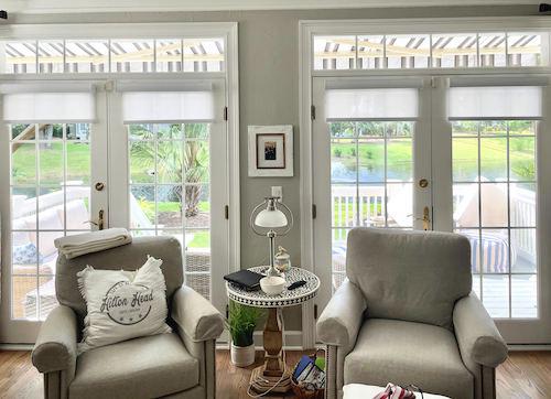 How cozy is this living room? Check out how these gorgeous roller shades add a radiant glow to this space, while maintaining the view! With more than 100 different styles and 240 decorative options, you will be sure to find the perfect window treatment for your home.