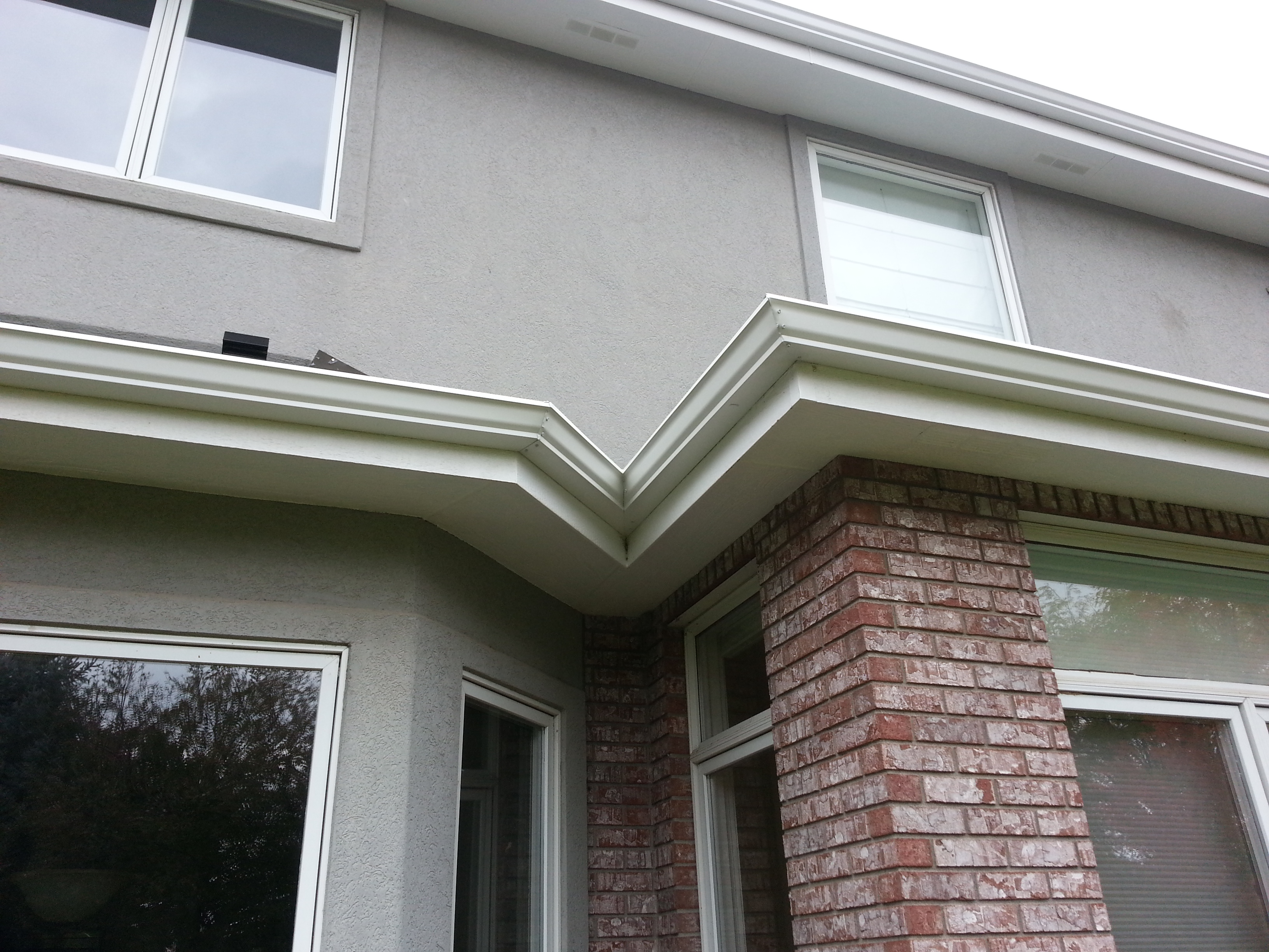 Precision Seamless Gutters Logo