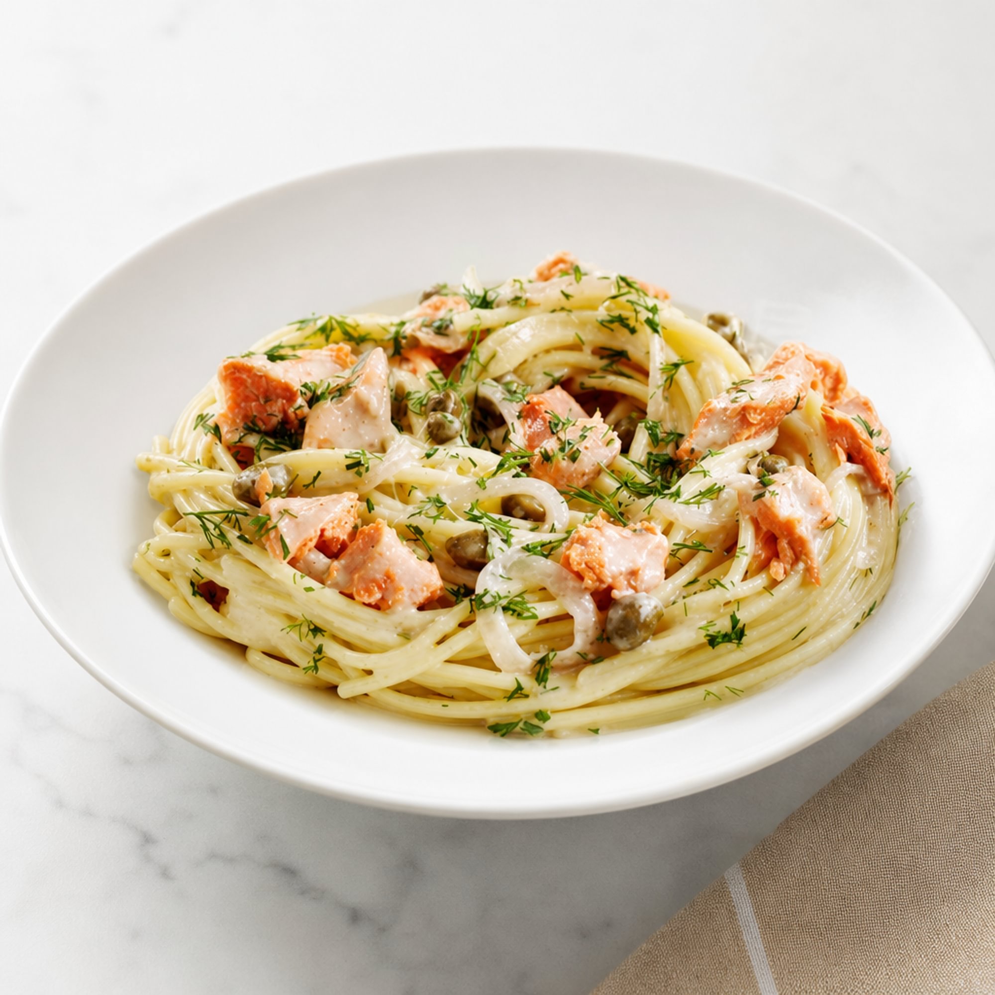 Salmon with Caper Wine Sauce Over Pasta