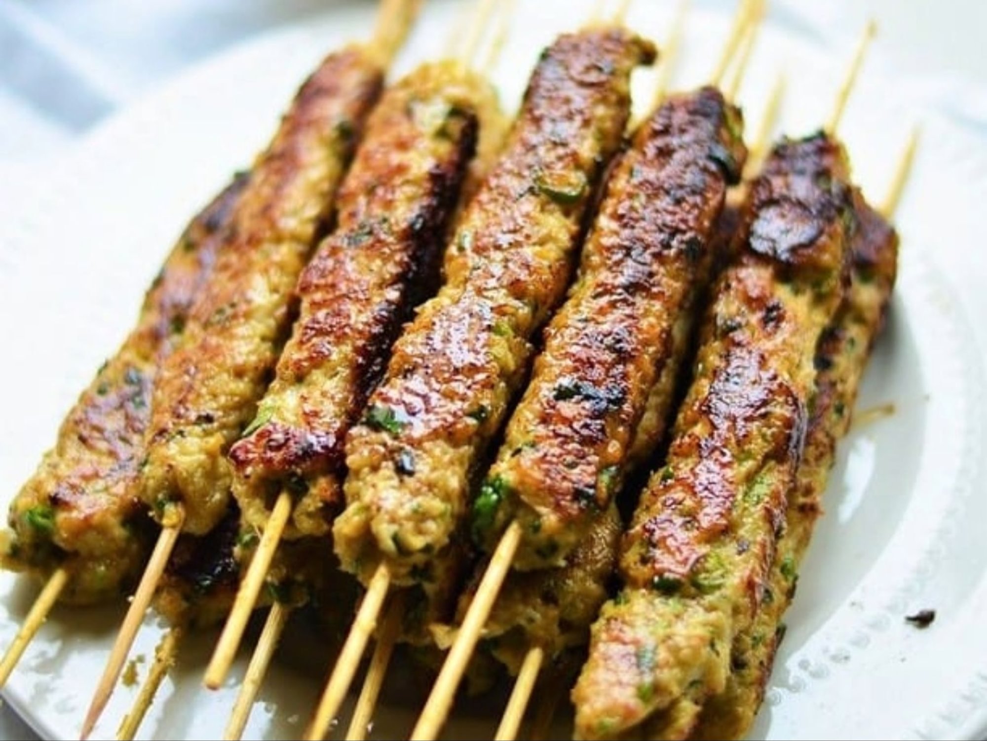 Chicken Seekh Kabab, and served with Basmati Rice.
