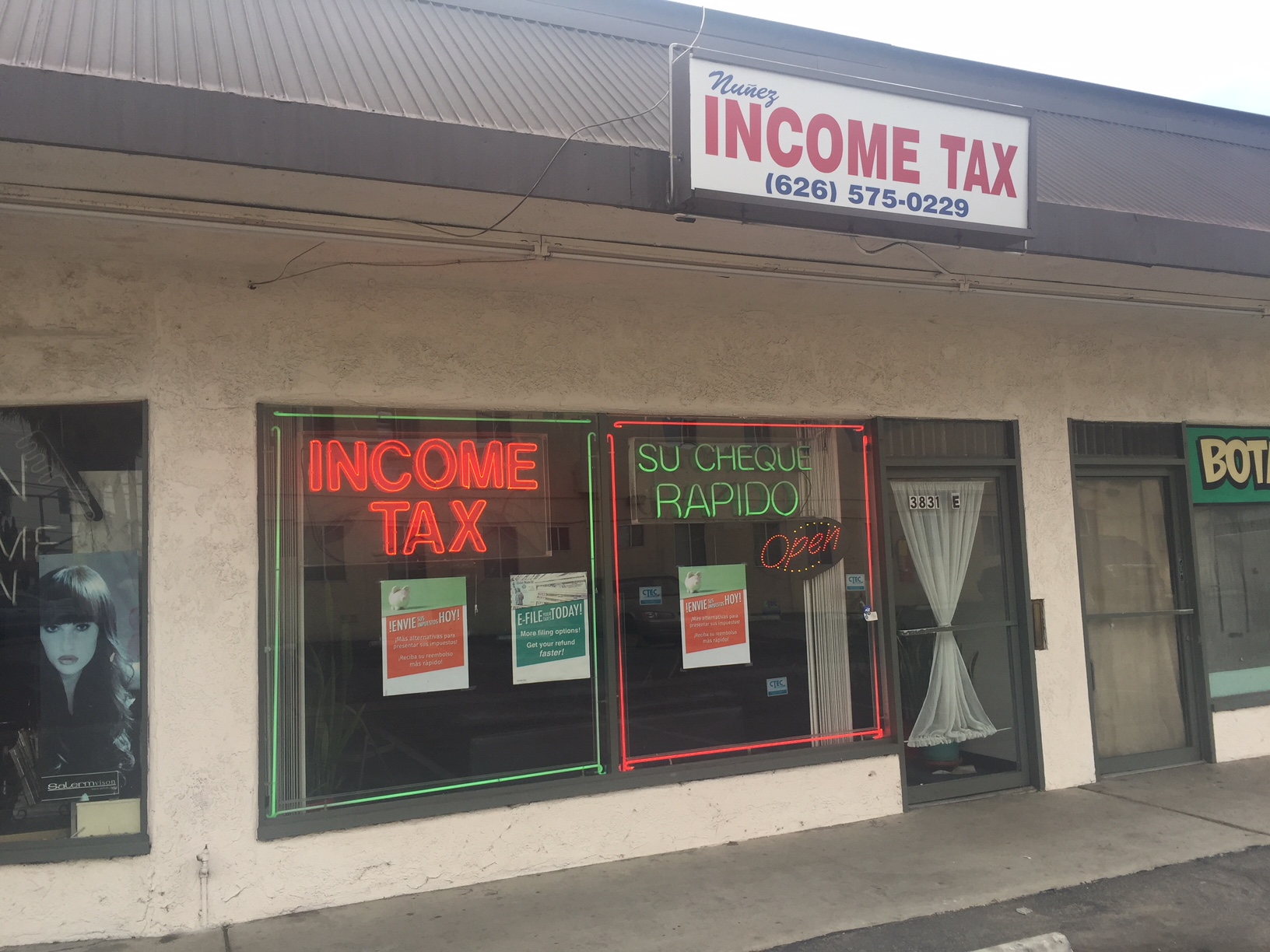 Nun~ez Income Tax Services Logo