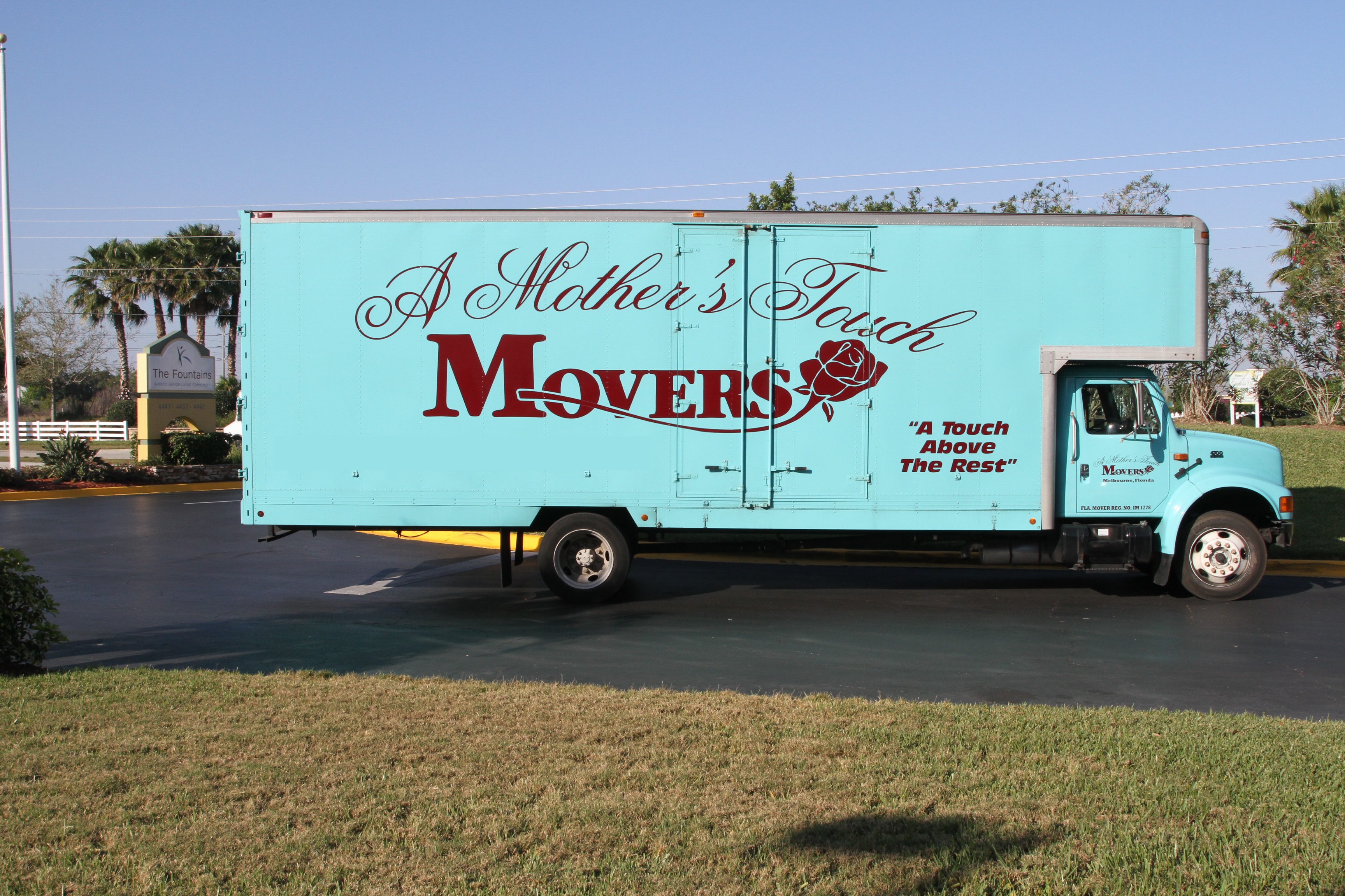 A Mother&apos;s Touch Movers Logo