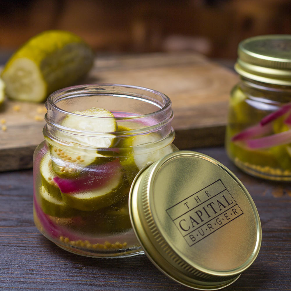 Every dining experience begins with a complimentary Mason Jar of House-Made Pickles