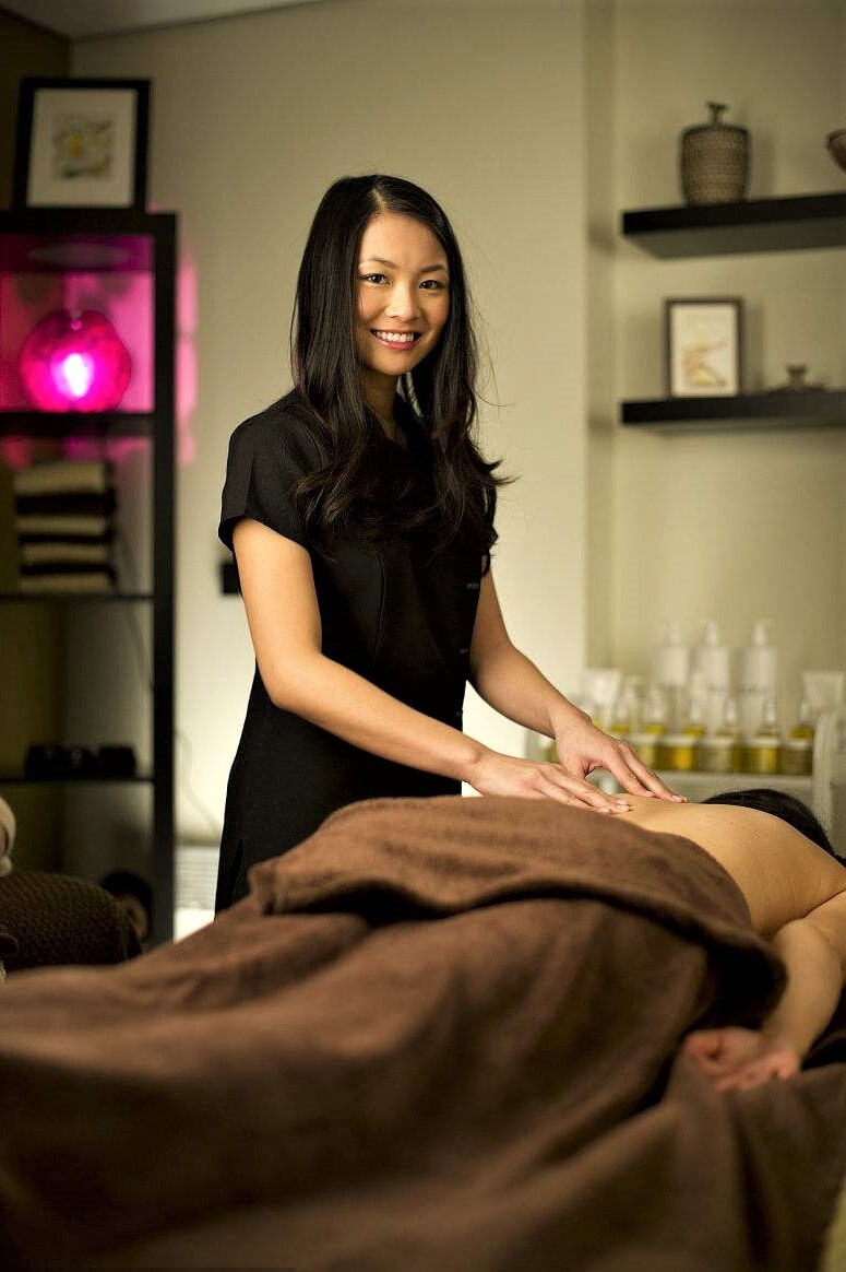 Asian masseuse seduces client into fan image