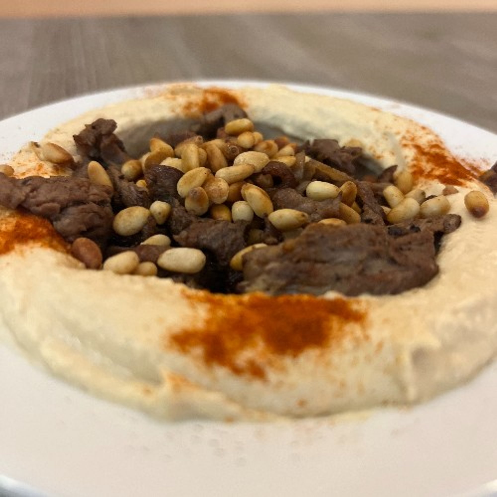 Hummus With Meat And Pine Nuts