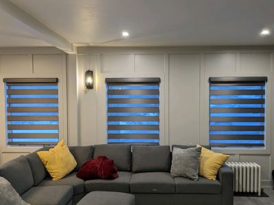 Sheer Shades, also known as Dual Shades, from Budget Blinds of Rock Springs reduce glare and help block out harmful UV rays that can damage your floors and furnishings. Make a statement and redefine elegance with Dual Shades in your home.