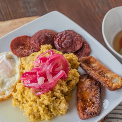 Mangú with fried Dominican cheese, salami & eggs any style