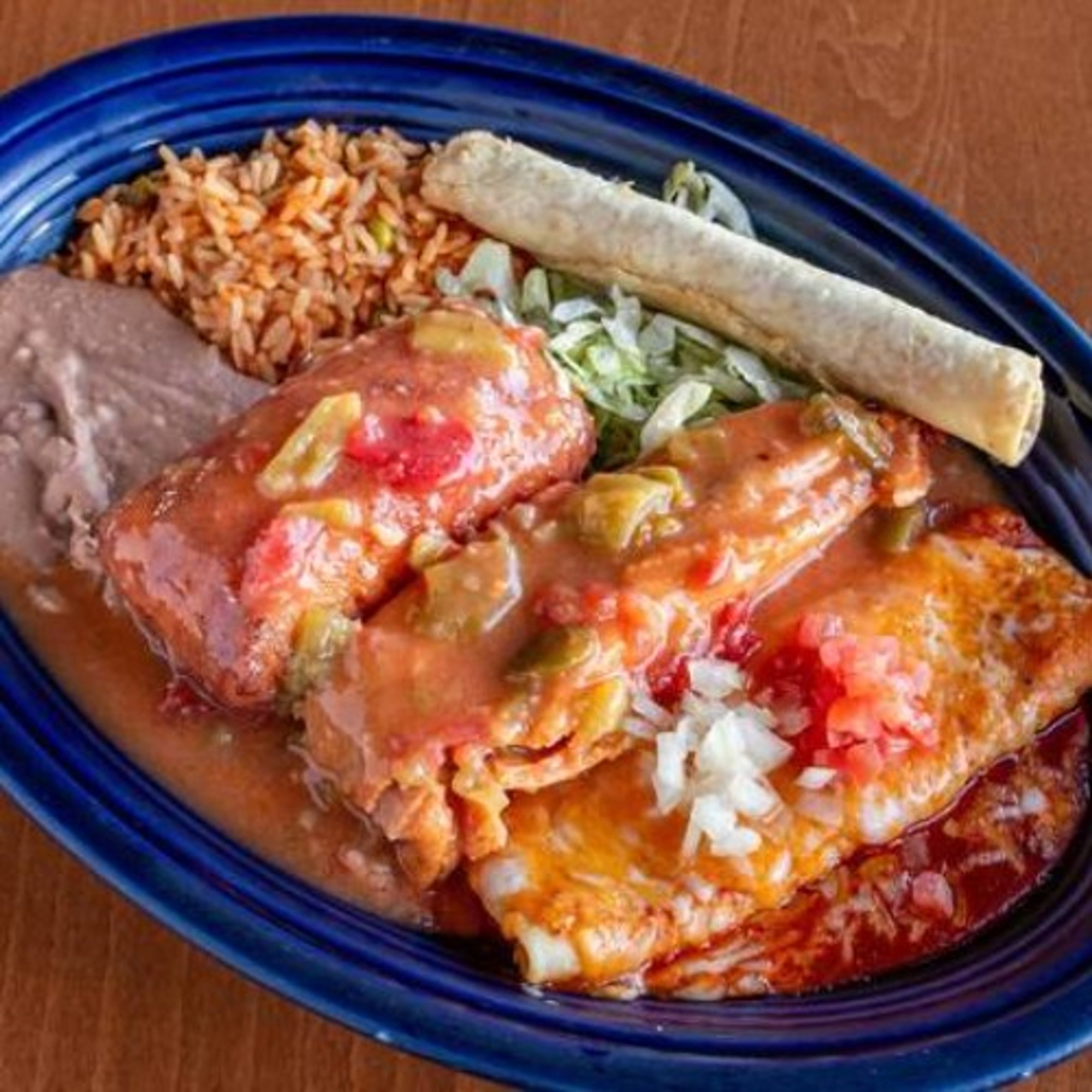 #9 Enchilada, Tamale, Chile Relleno, Taquito, Beans and Rice