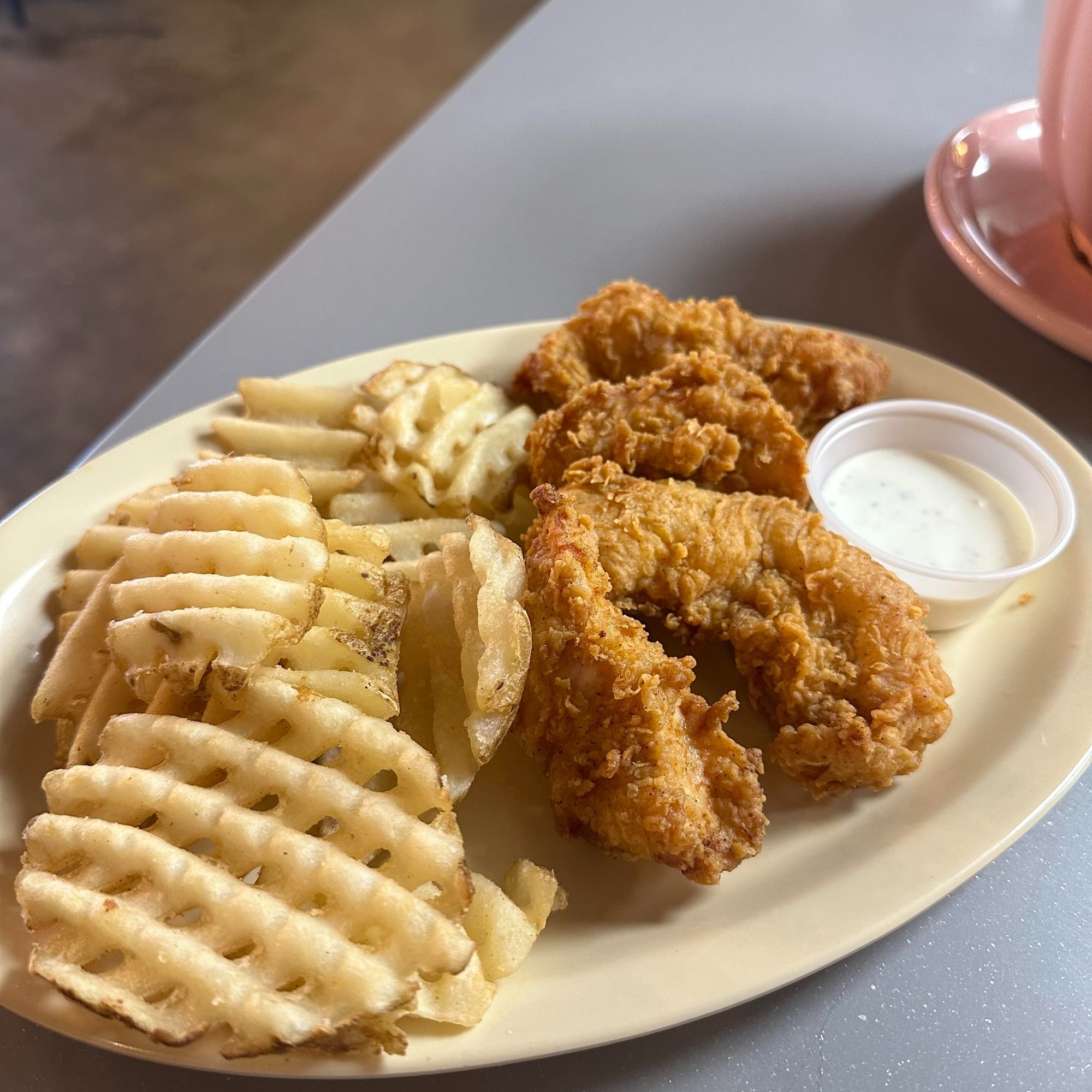2 Pieces Chicken Strips & Fries