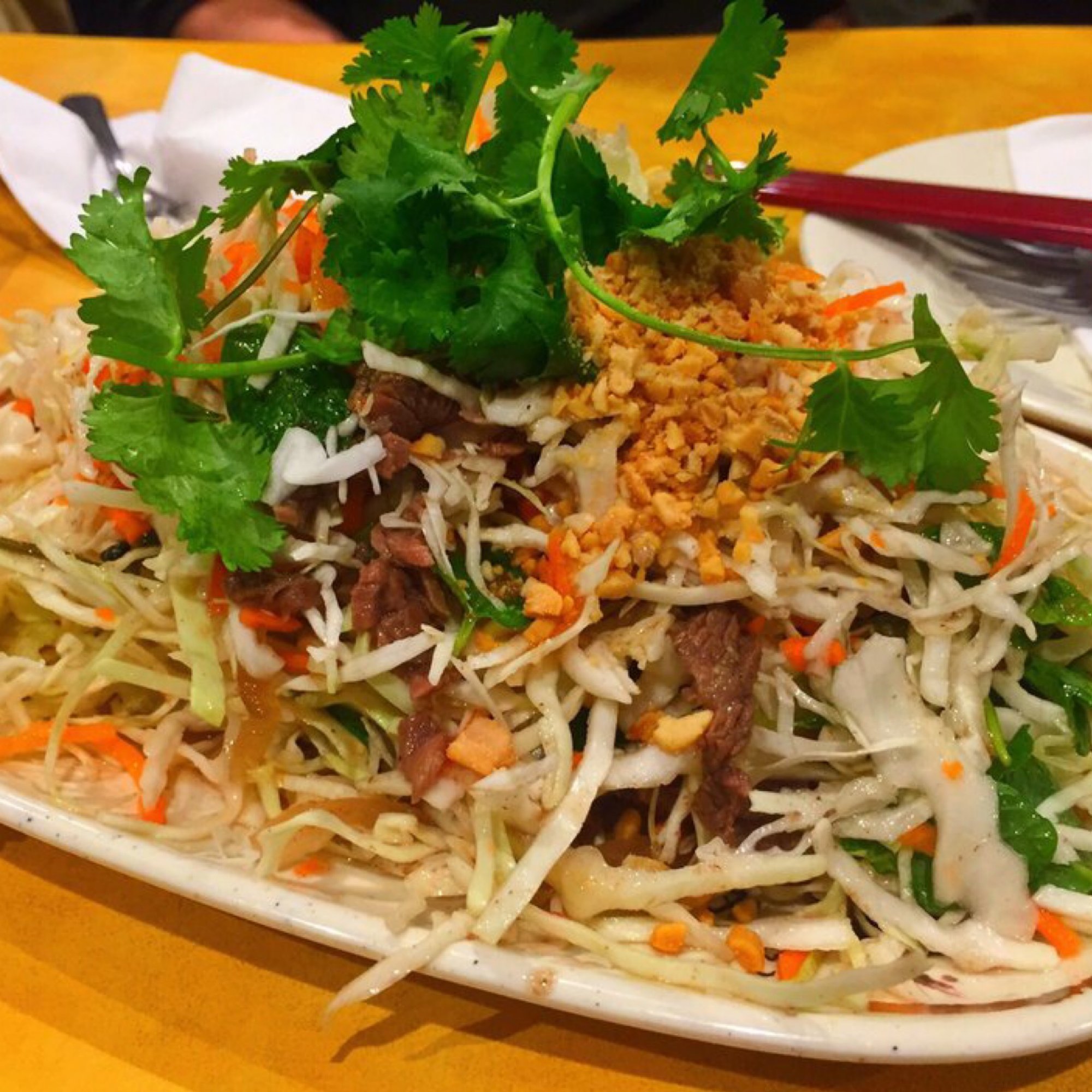 36. lemon beef salad (contains raw beef) - Bò tái chanh