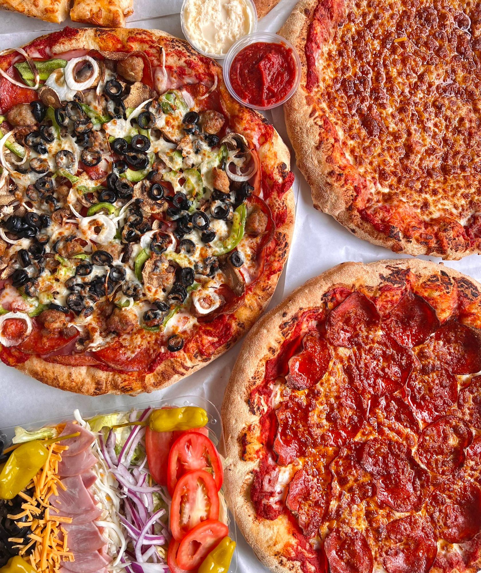 55.99 Medium Specialty Pizza, Large-2 Topping Pizza, Bread and 2 Liter Soda
