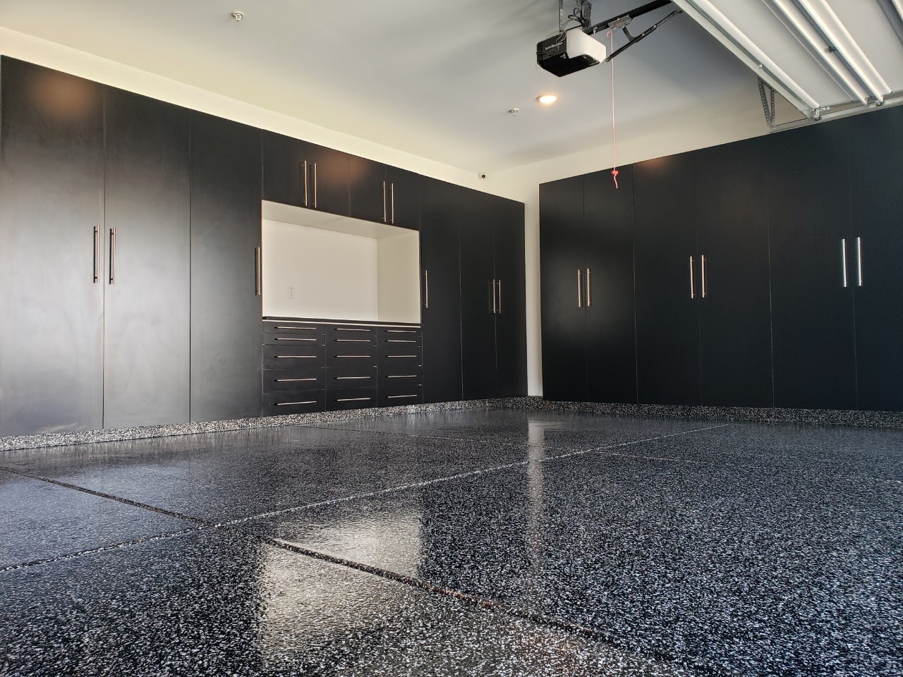 Black Cabinets with Custom Salt & Pepper Epoxy