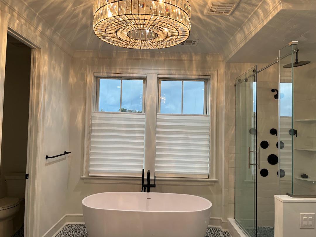 Want to create a fresh, beautiful look in your bathroom? Here's some inspiration from Phillipsburg! To add some privacy and shade, we installed Hunter Douglas Solera Shades!