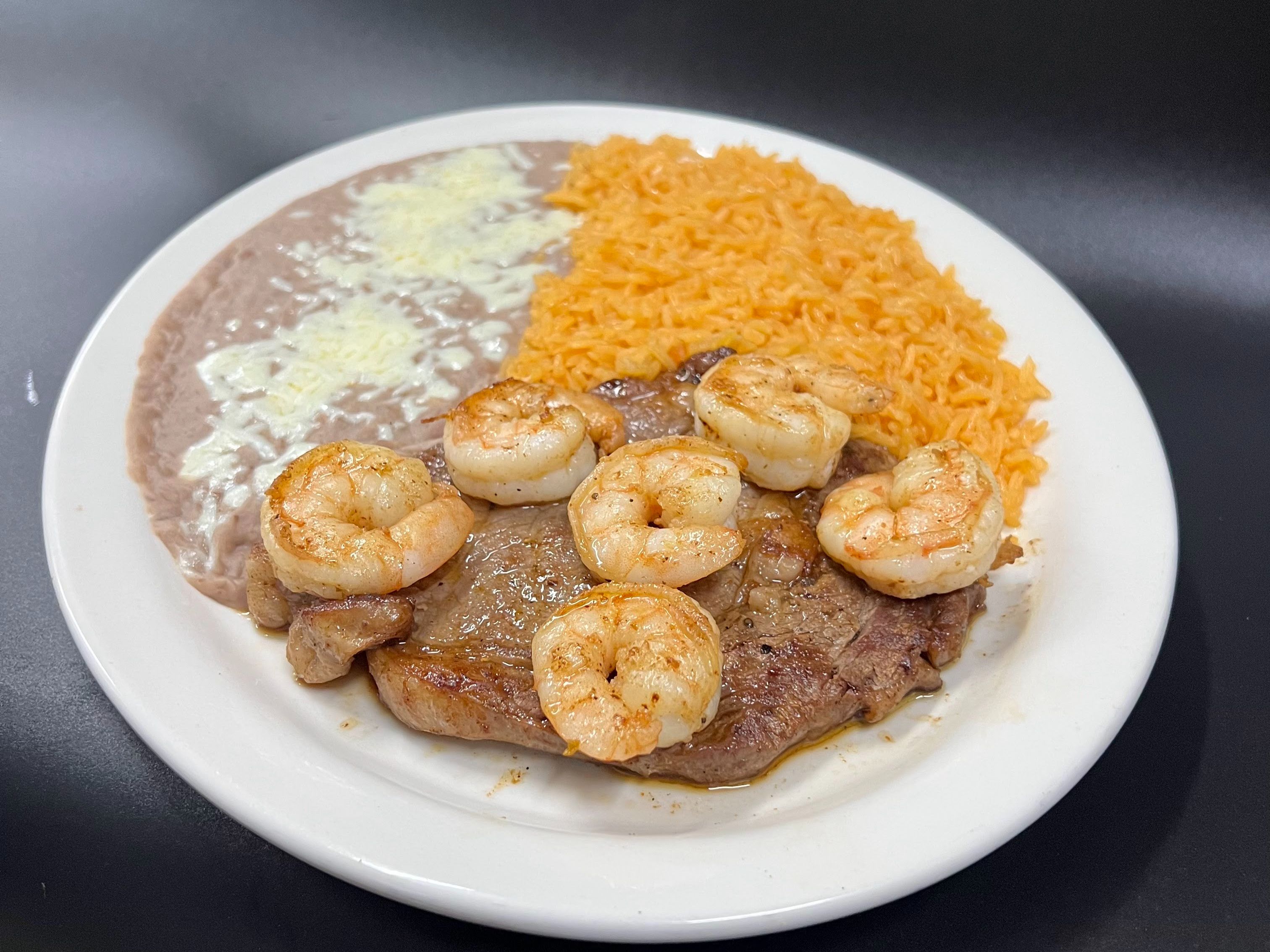 Steak con Camarones