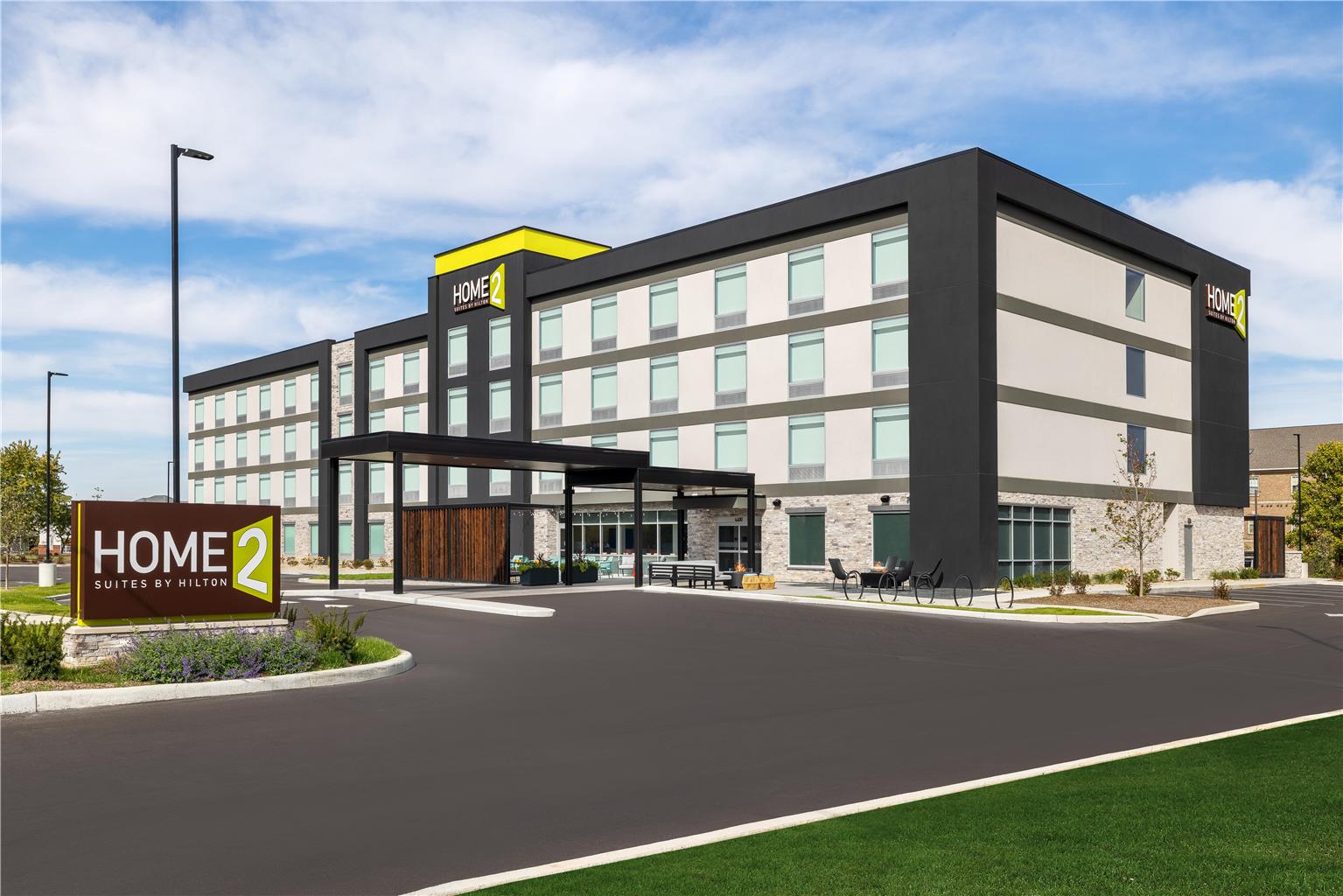 Home2 Suites by Hilton Muncie Logo